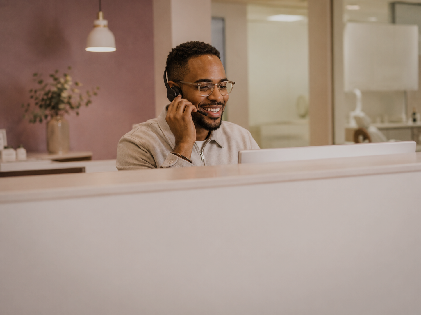 Dental practice team member handling an incoming call